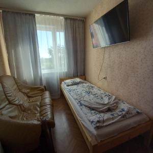 TV a/nebo společenská místnost v ubytování Riverside Motel Jelgava