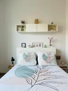 Postel nebo postele na pokoji v ubytování Downtown Quiet and Peacefull Apartment