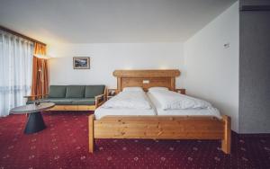 Postel nebo postele na pokoji v ubytování Club Hotel rooms only - by Mountain Hotels + 12 fotografií