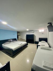 Ένα ή περισσότερα κρεβάτια σε δωμάτιο στο Hotel Estefanía Princess 84 +65 φωτογραφίες