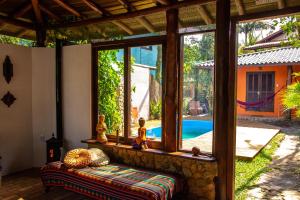 Πισίνα στο ή κοντά στο Pousada Paradise Ferrugem