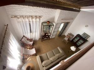an overhead view of a living room with a couch at Casa Beira Mar Itamaracá in Itamaracá