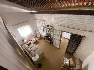 an overhead view of a living room with a couch and a fireplace at Casa Beira Mar Itamaracá in Itamaracá +57 photos