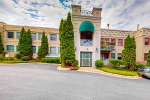 a building with a car parked in front of it at Hiawassee E302 in Asheville