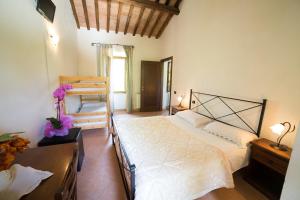 A bed or beds in a room at Camping dei Tigli