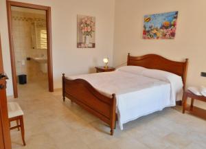Postel nebo postele na pokoji v ubytování Le Terrazze Miramare B&B