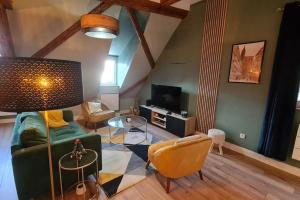 TV a/nebo společenská místnost v ubytování Duplex Centre - Le Marché