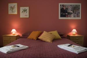A bed or beds in a room at B&B La Cittadella Univeristaria Policlinico Catania