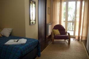 A bed or beds in a room at B&B La Cittadella Univeristaria Policlinico Catania