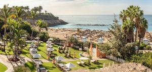 an aerial view of the beach at a resort at The Villas at Bahia del Duque in Adeje