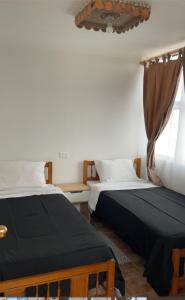 En eller flere senge i et værelse på apartamento vista al mar