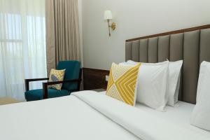 Golden Fields Resort 객실 침대