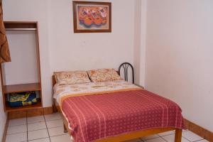 Voodi või voodid majutusasutuse Yaki Hostel toas