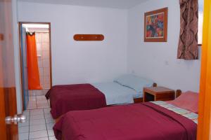 Voodi või voodid majutusasutuse Yaki Hostel toas