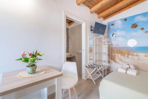 Postel nebo postele na pokoji v ubytování Siracusa mare