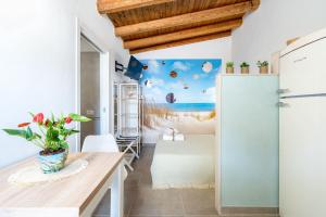 Postel nebo postele na pokoji v ubytování Siracusa mare