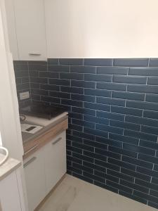 Kuchyň nebo kuchyňský kout v ubytování Lola