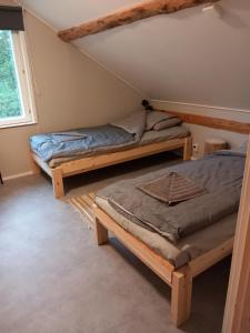 Tempat tidur dalam kamar di Sevetin Baari & Guesthouse