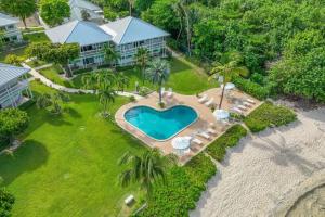 an aerial view of a house with a swimming pool at Cocoplum #10 in George Town