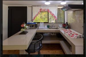 A kitchen or kitchenette at CASA KENJY