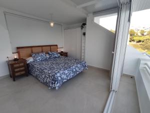 Posteľ alebo postele v izbe v ubytovaní Front Sea View Penthouse