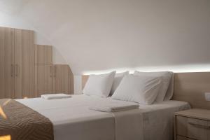 EDEL Luxury Apartments客房内的一张或多张床位