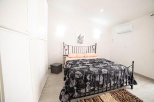 Postel nebo postele na pokoji v ubytování L' antico portone