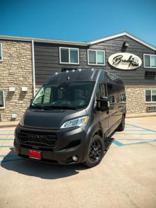 a black van parked in front of a building at Brady Hotel in New Florence