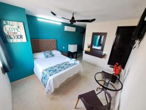 Katil atau katil-katil dalam bilik di Hotel San Miguel