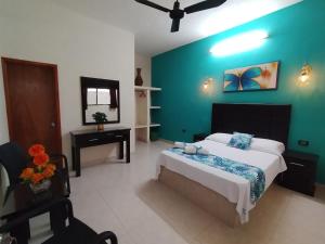 Katil atau katil-katil dalam bilik di Hotel San Miguel