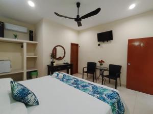 Katil atau katil-katil dalam bilik di Hotel San Miguel