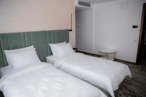 Postel nebo postele na pokoji v ubytování RIVER PLACE