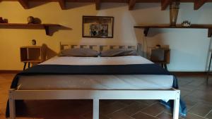 A bed or beds in a room at L'angolo nascosto
