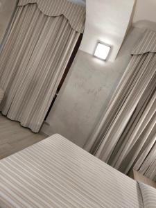Ένα ή περισσότερα κρεβάτια σε δωμάτιο στο Hotel Antico Distretto