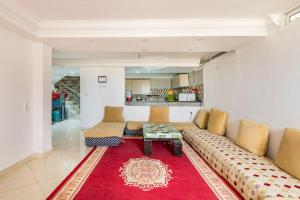 Posezení v ubytování Villa avec vue sur mer