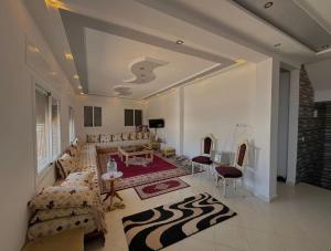 Posezení v ubytování Villa avec vue sur mer