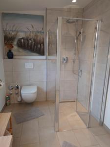 Koupelna v ubytování Kleine-Ostseeliebe 2 + 3 fotografie