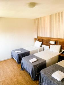 Krevet ili kreveti u jedinici u objektu Hotel do Largo Manaus