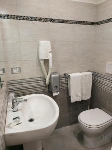 Ένα μπάνιο στο Hotel Antico Distretto