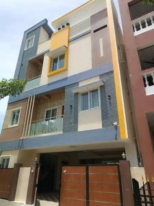 a building with a gate in front of it at Alif serviced Apartment for Families and Executives in Tambaram