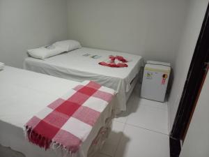 Ένα ή περισσότερα κρεβάτια σε δωμάτιο στο HOTEL SANTA FÉ