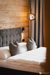 Ένα ή περισσότερα κρεβάτια σε δωμάτιο στο Stoacherhof Apartments