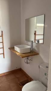 a bathroom with a sink and a toilet at Paradise Villa for 6 at Odemira River&Country in Santa Clara-a-Velha