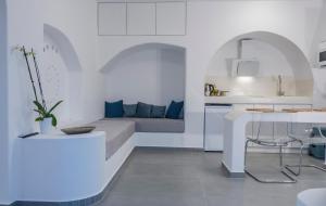 a living room with a couch and a table at Shape-Spiral in Kalymnos