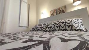 A bed or beds in a room at WikiLoft