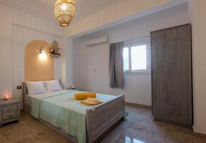 a bedroom with a large bed and a window at Tranquilo Boutique Hostel - Dahab in Dahab
