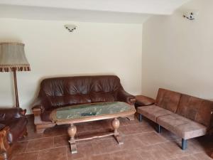 Ruang duduk di Cosy house for relaxing and sightseeing