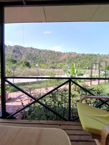 a balcony with a view of a mountain at Arlin Bungalows in Kemer