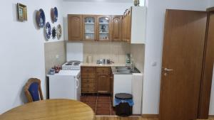 Kjøkken eller kjøkkenkrok på Roomz apartments Užice