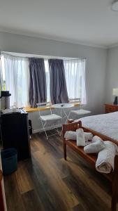 Postel nebo postele na pokoji v ubytování B&B Rocas Santo Domingo